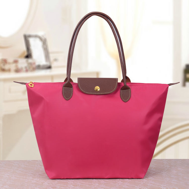 Sac bandoulière femme en trois formats, neuf coloris, rouge rosé