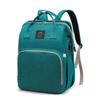 Sac à langer 3 en 1, sac à dos transformable en lit nomade, vert