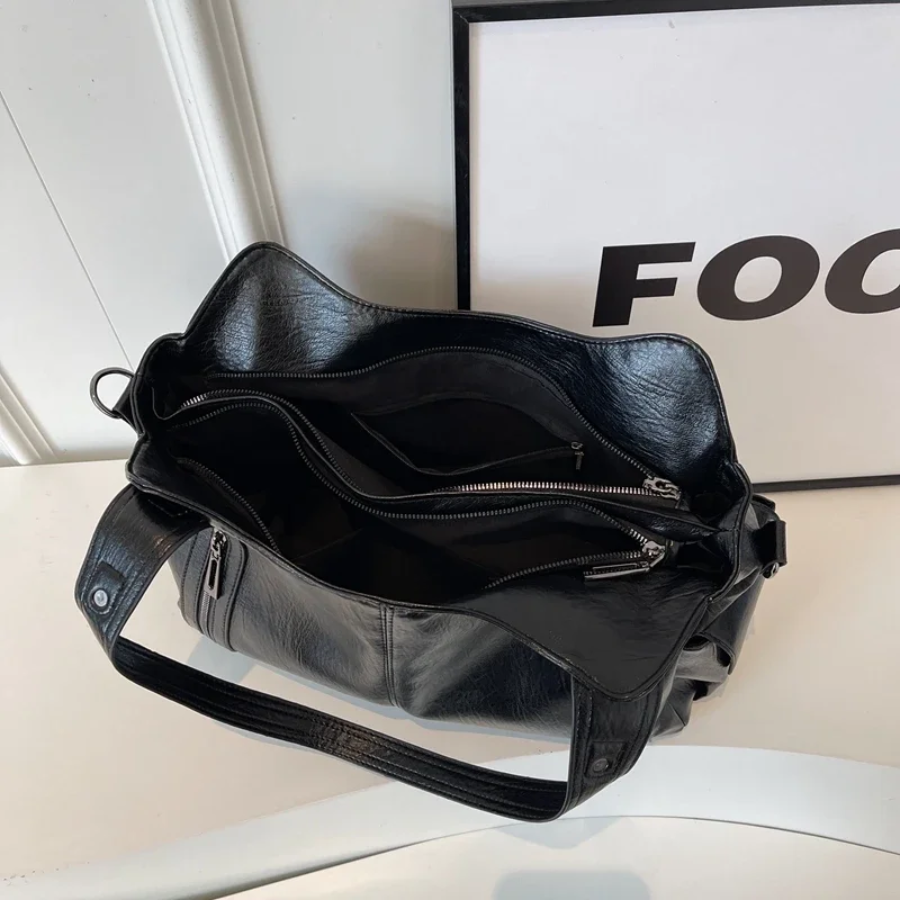 Sac bandoulière femme spacieux à poches, format ordinateur