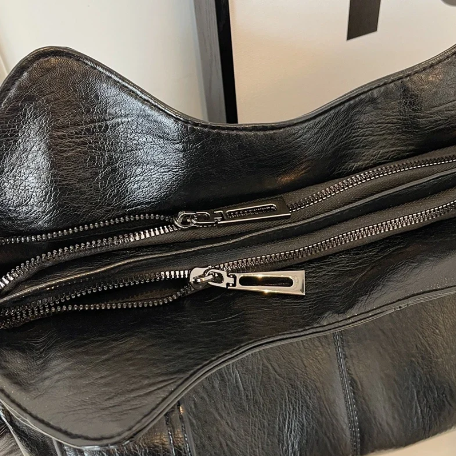 Sac bandoulière femme spacieux à poches, format ordinateur