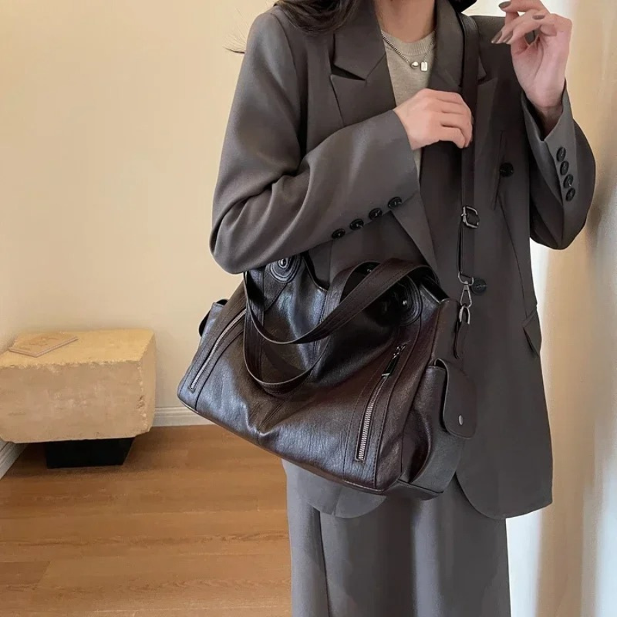 Sac bandoulière femme spacieux à poches, format ordinateur