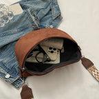 Sac banane femme aspect daim, bandoulière à motifs amovible