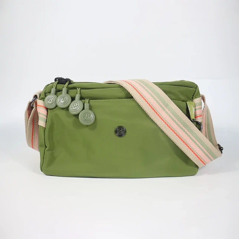 Sac banane femme en nylon imperméable, quatre poches zippées, vert