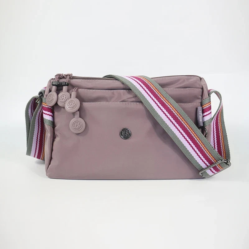 Sac banane femme en nylon imperméable, quatre poches zippées, violet clair