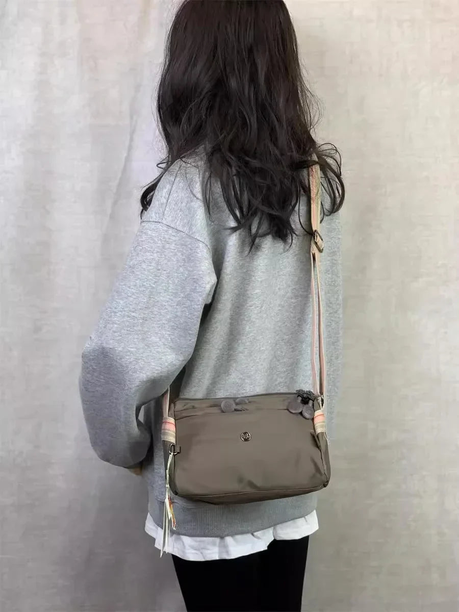 Sac banane femme en nylon imperméable, quatre poches zippées