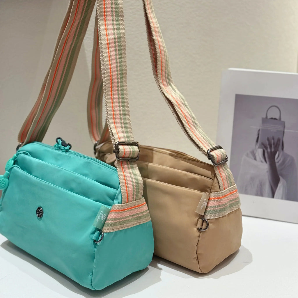 Sac banane femme en nylon imperméable, quatre poches zippées