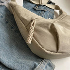 Grand sac banane femme, cinq poches dont quatre zippées