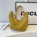 Grand sac banane femme, cinq poches dont quatre zippées