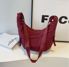 Grand sac banane femme, cinq poches dont quatre zippées