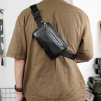 Sac banane homme en cuir noir à compartiments, porté main ou taille, noir