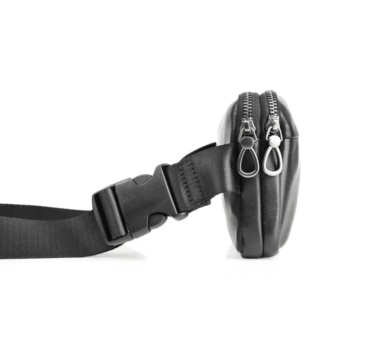 Sac banane homme en cuir noir à compartiments, porté main ou taille