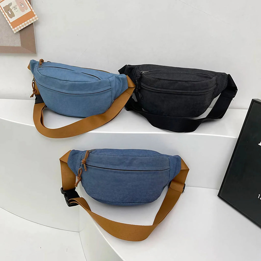 Sac banane en jean mixte, trois poches zippées