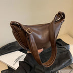 Sac banane femme de forme arrondie, café ou marron clair