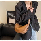 Sac banane femme de forme arrondie, café ou marron clair