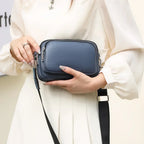 Petit sac carré bandoulière femme en cuir grainé