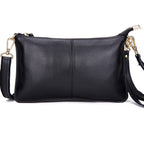 Sac bandoulière forme enveloppe en cuir grainé noir, noir