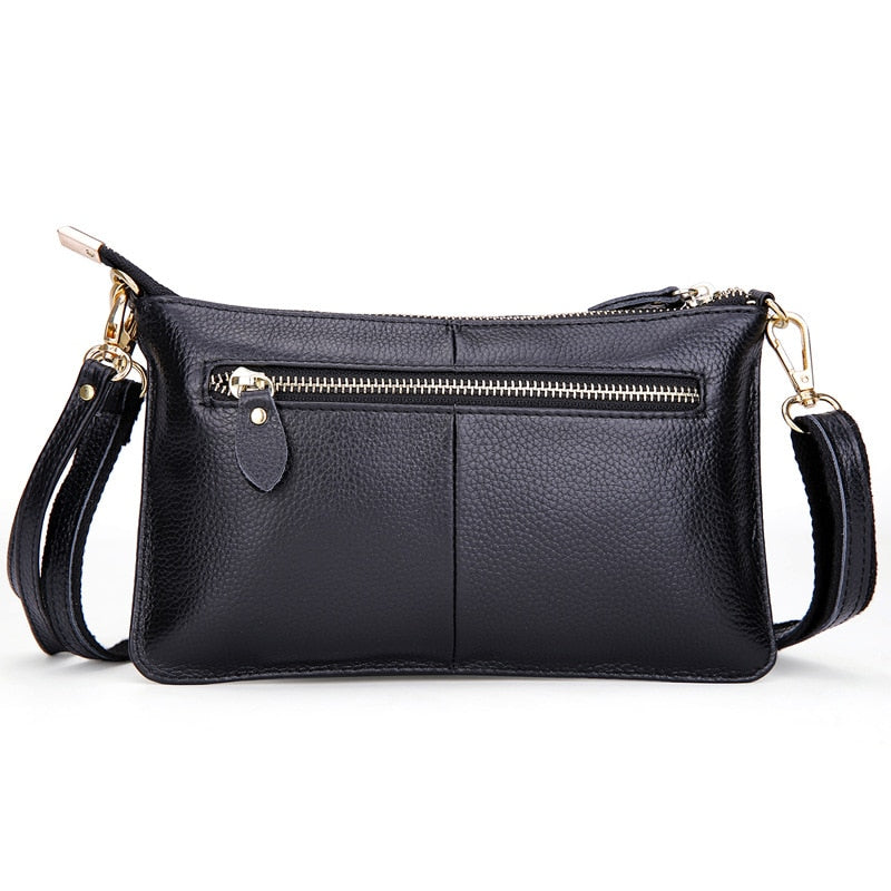Sac bandoulière forme enveloppe en cuir grainé noir