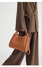 Sac bandoulière femme en cuir grainé, trois compartiments