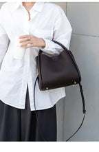 Sac bandoulière femme en cuir grainé, trois compartiments