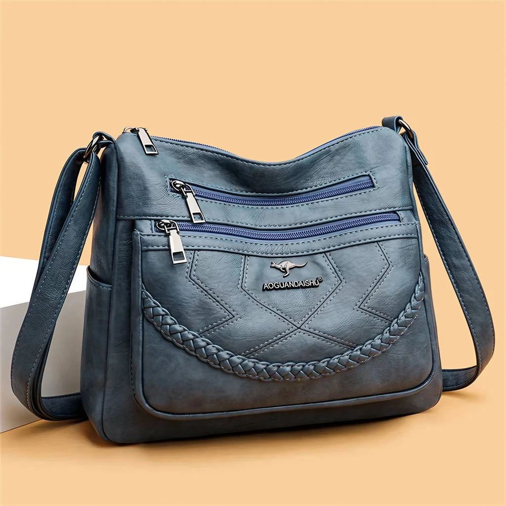 Sac bandoulière femme zippé à bouton aimanté, quatre coloris
