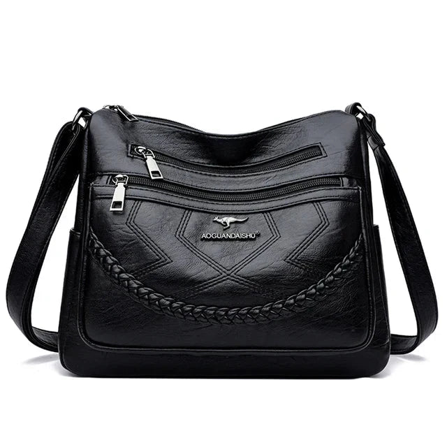 Sac bandoulière femme zippé à bouton aimanté, quatre coloris