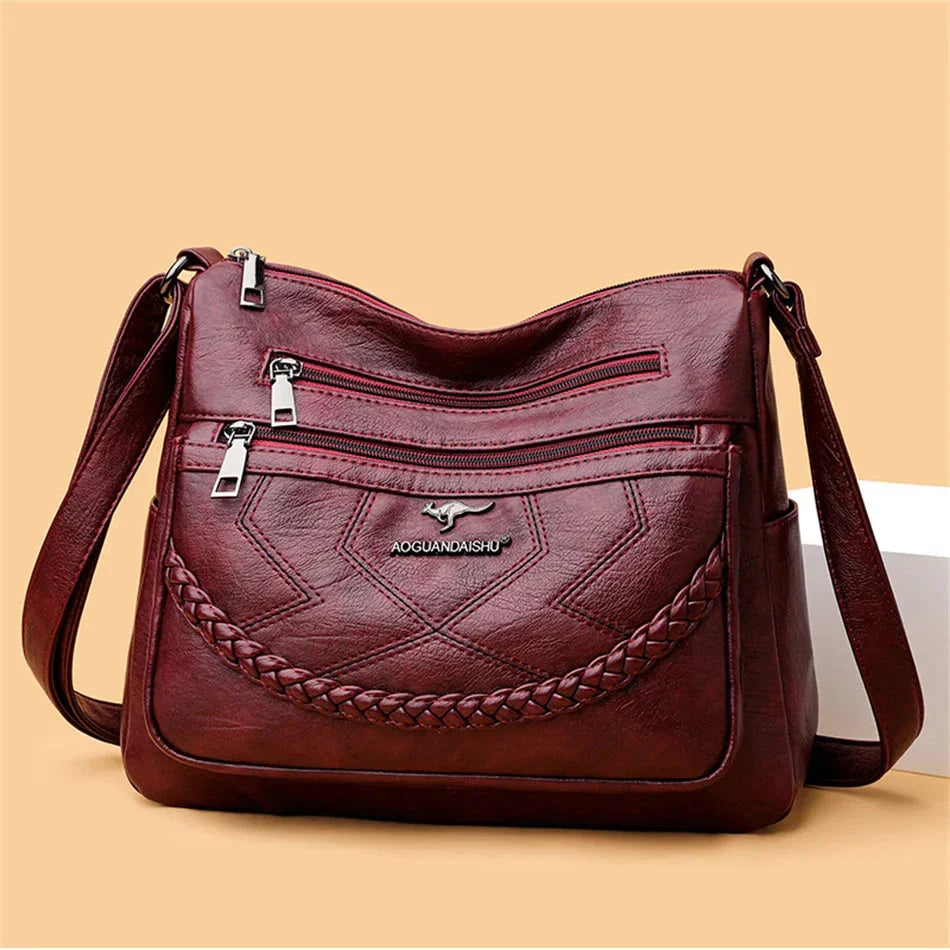 Sac bandoulière femme zippé à bouton aimanté, quatre coloris