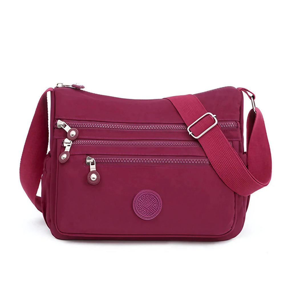 Sac bandoulière femme multipoches en tissu Oxford déperlant, rouge framboise
