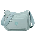 Sac bandoulière femme multipoches en tissu Oxford déperlant, bleu ciel