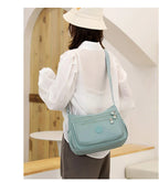 Sac bandoulière femme multipoches en tissu Oxford déperlant