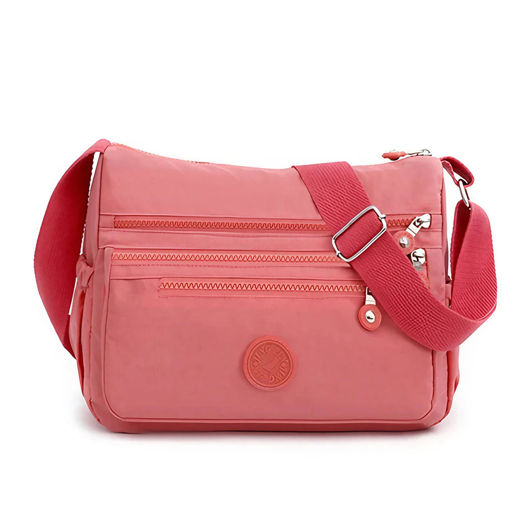 Sac bandoulière femme multipoches en tissu Oxford déperlant, rose