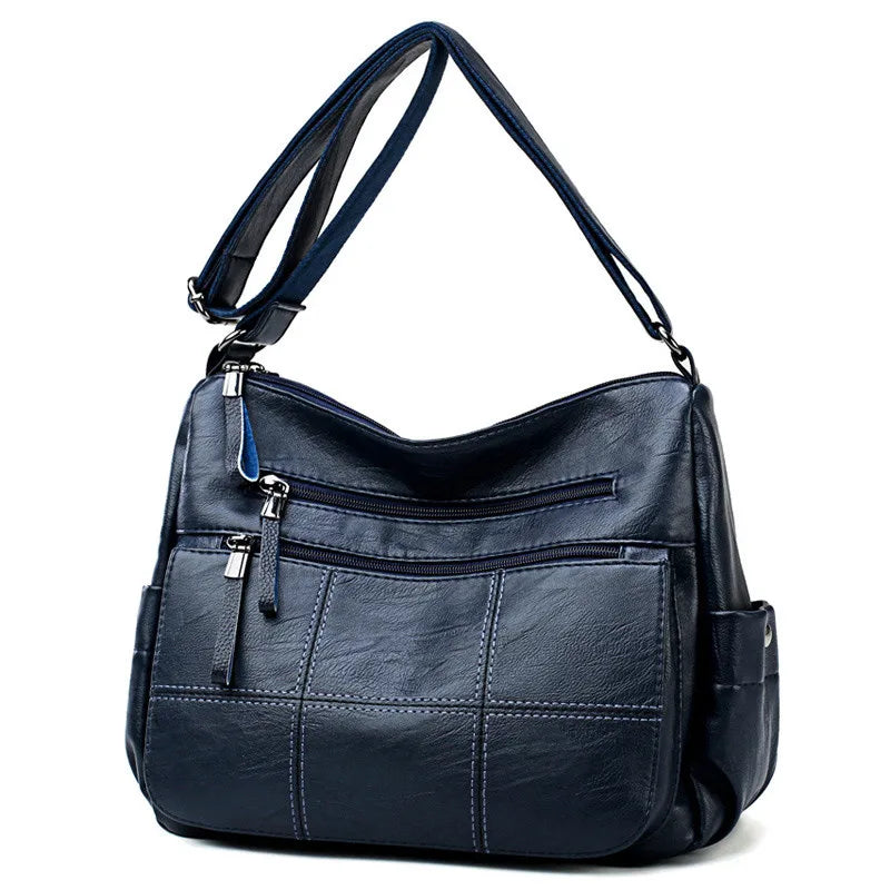 Sac bandoulière femme forme hobo, deux compartiments zippés, bleu foncé