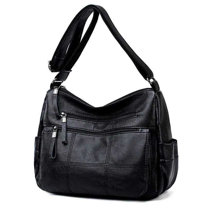 Sac bandoulière femme forme hobo, deux compartiments zippés, noir