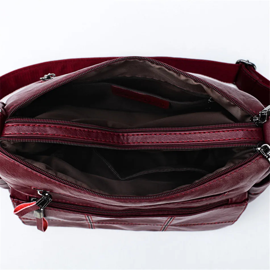 Sac bandoulière femme forme hobo, deux compartiments zippés