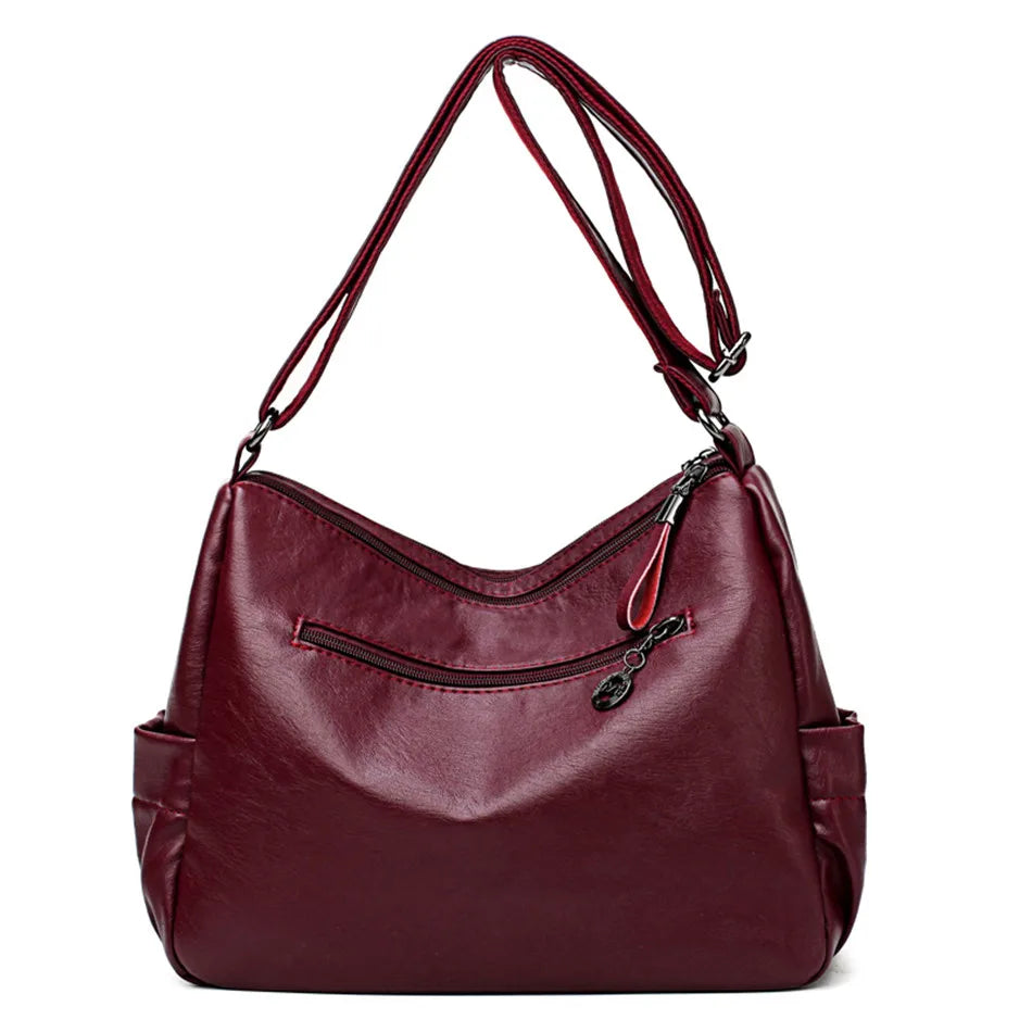 Sac bandoulière femme forme hobo, deux compartiments zippés