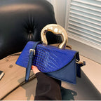 Sac bandoulière femme effet croco, forme allongée, six coloris