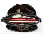 Petit sac bandoulière femme noir en similicuir, poches zippées