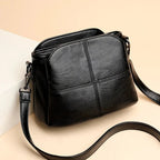 Petit sac bandoulière femme noir en similicuir, poches zippées, noir