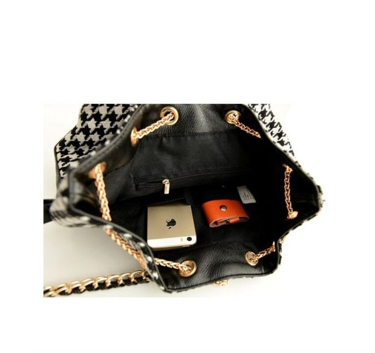 Sac bandoulière femme à motif pied-de-poule, finitions dorées