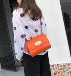 Petit sac bandoulière femme à chaîne et paillettes, six coloris, orange