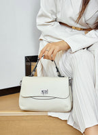 Sac bandoulière femme en cuir à bouton décoratif, huit coloris