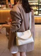 Sac bandoulière femme en cuir zippé, six coloris