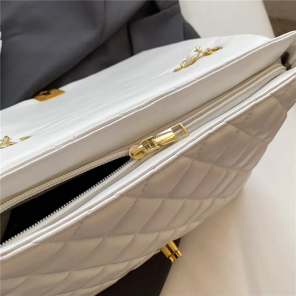 Sac matelassé femme à chaîne coulissante dorée, 27 x 18 cm