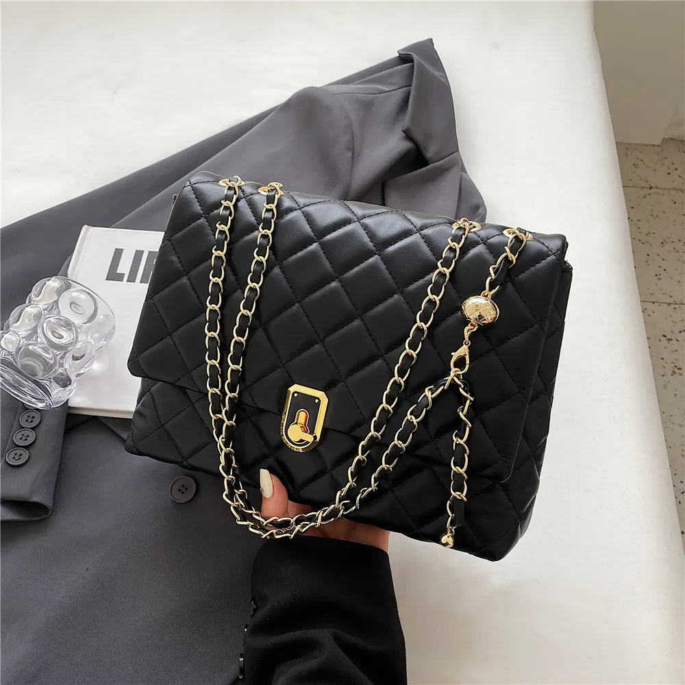 Sac matelassé femme à chaîne coulissante dorée, 27 x 18 cm, noir