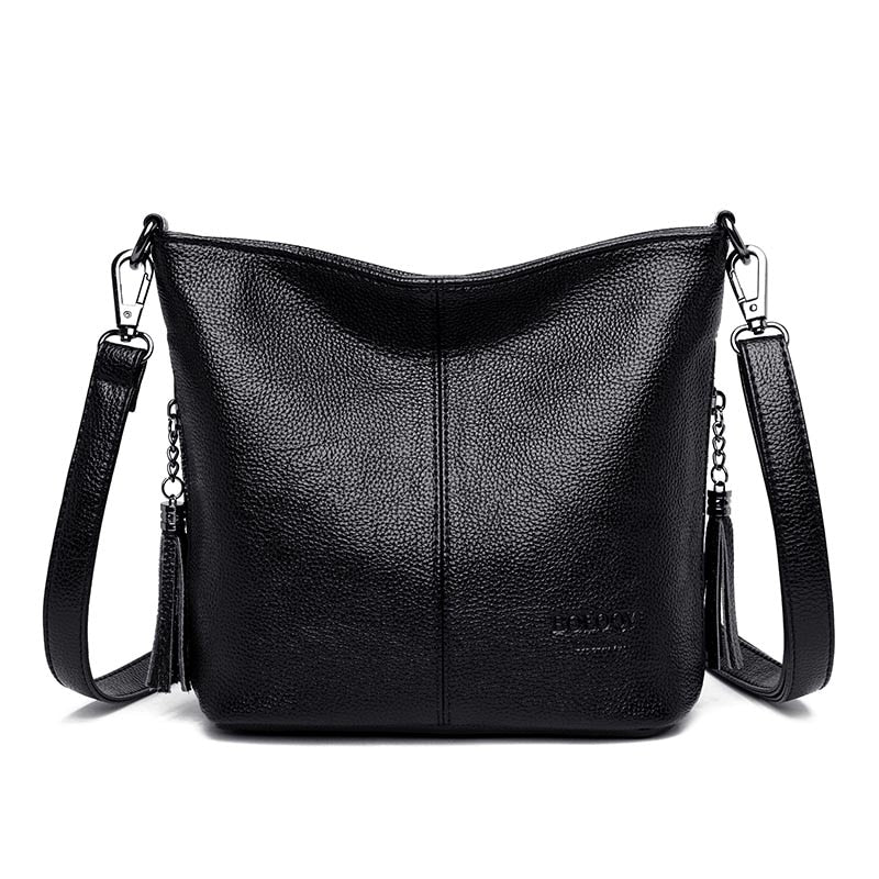 Sac bandoulière femme noir en similicuir grainé, forme trapèze