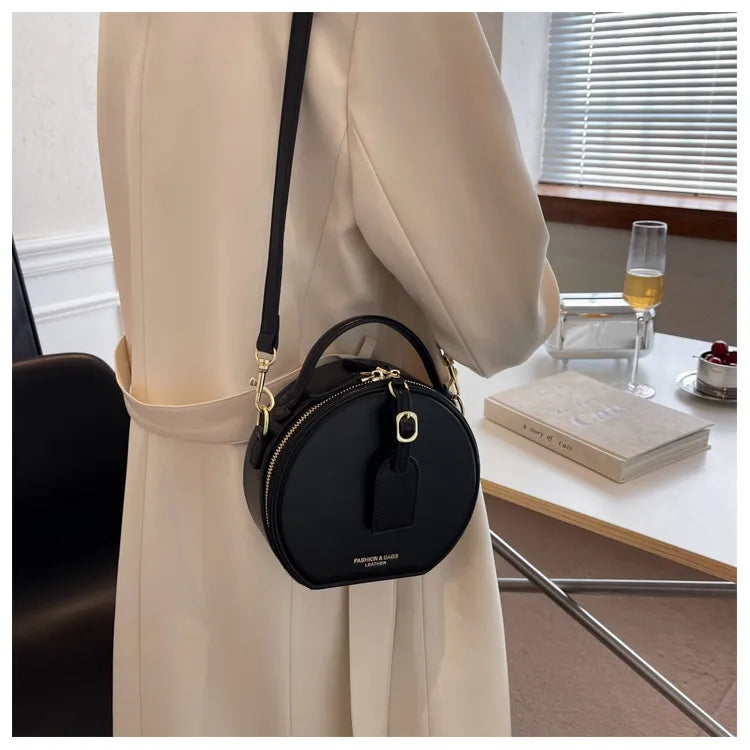 Sac bandoulière rond femme, deux compartiments, beige ou noir