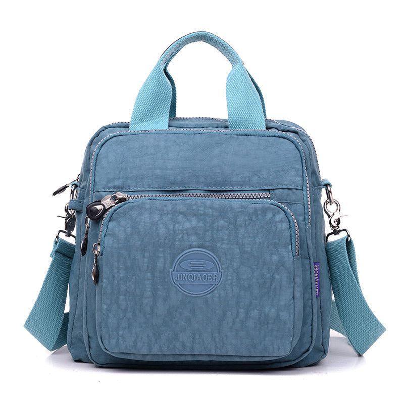 Sac bandoulière femme imperméable, trois façons de le porter, gris