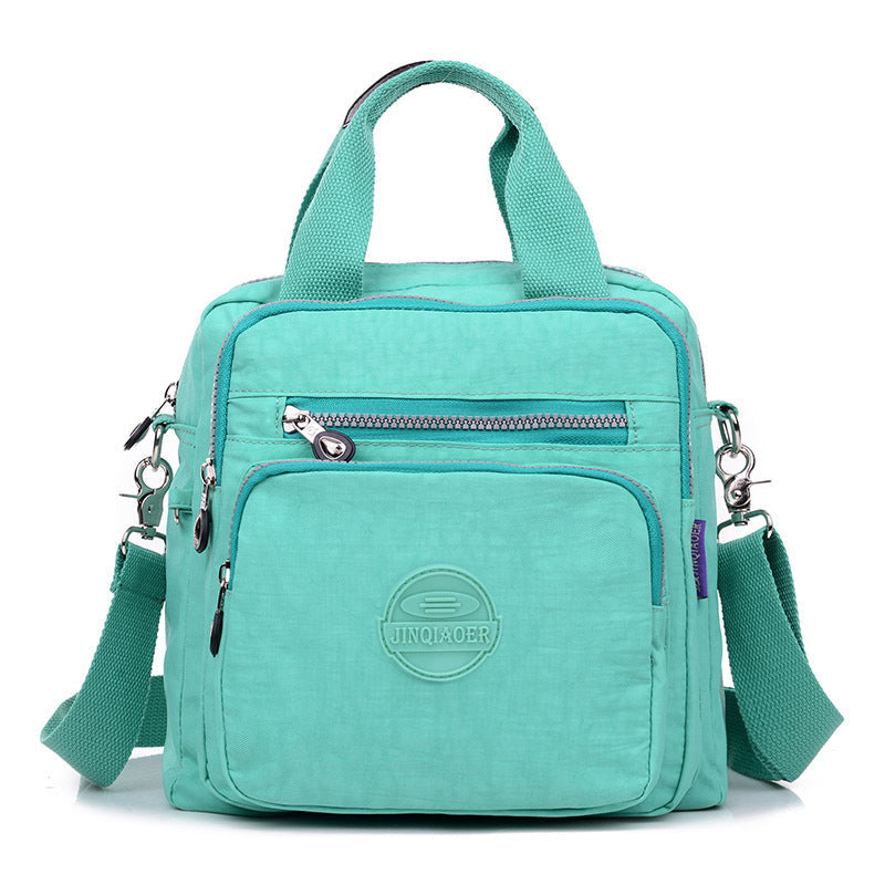 Sac bandoulière femme imperméable, trois façons de le porter, émeraude