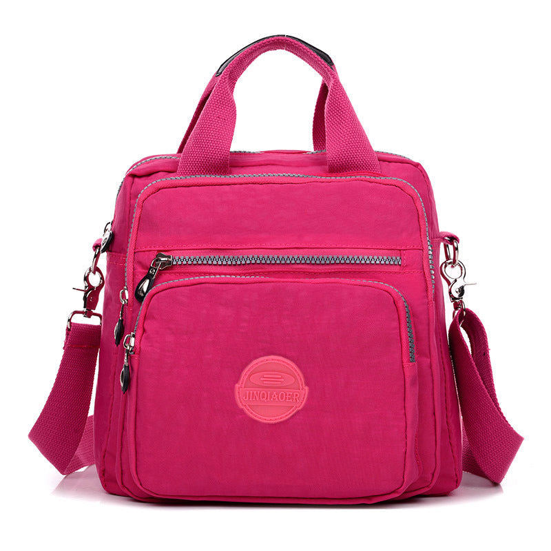 Sac bandoulière femme imperméable, trois façons de le porter, rose