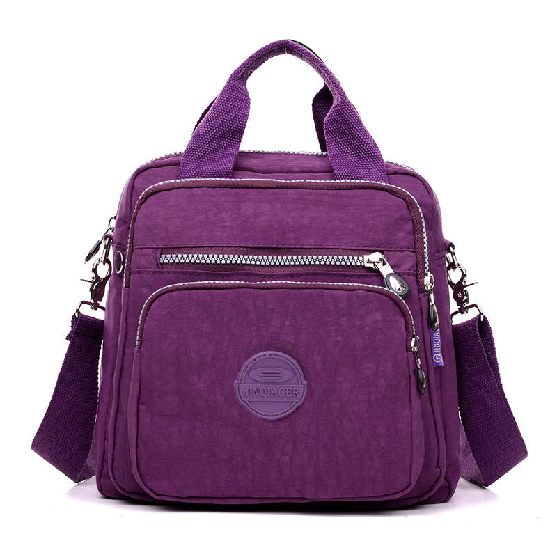 Sac bandoulière femme imperméable, trois façons de le porter, violet