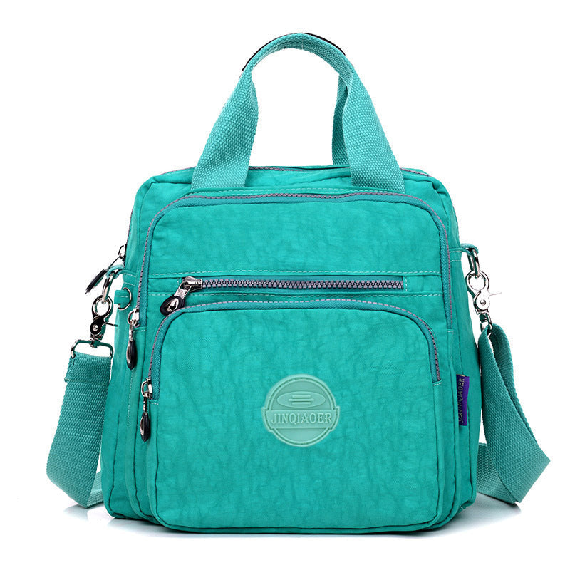 Sac bandoulière femme imperméable, trois façons de le porter, bleu vert